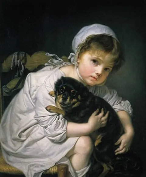 Young girl with a dog