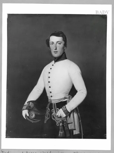 Portrait of a young gentleman in uniform