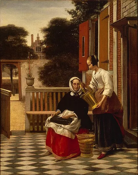 Señora y sirvienta con un cubo