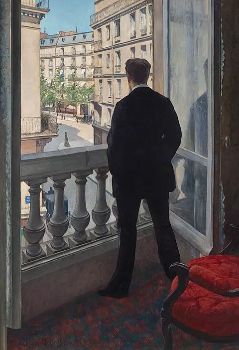 Hombre joven en la ventana