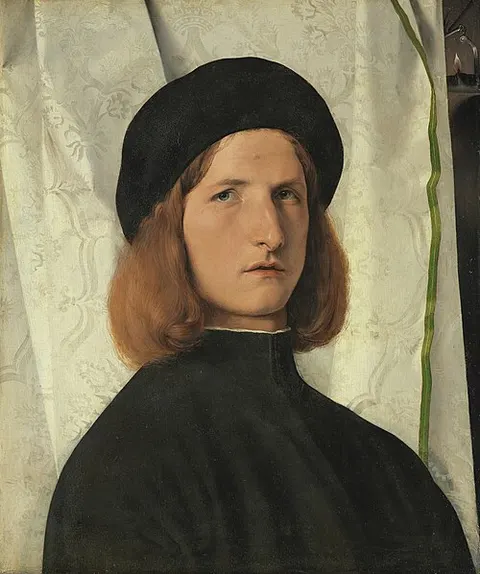 Retrato de joven con una lámpara