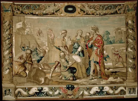 Dido shows Aeneas the plans for the fortifications of Carthage