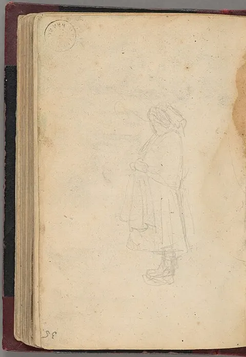 Figure of a woman with a headscarf