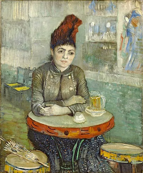 Agostina Segatori sentada en el Café du Tambourin
