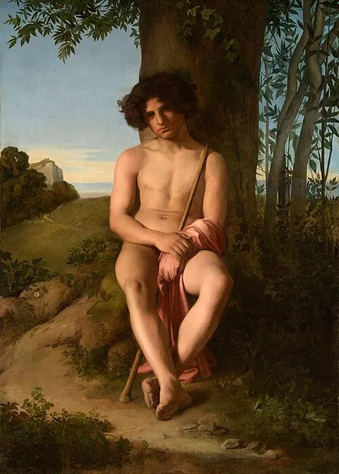 Joven pastor sentado