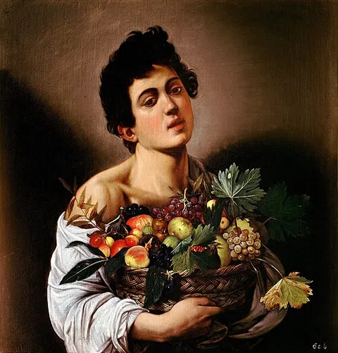 Niño con un cesto de frutas