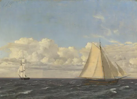 A cutter and a brig at sea.