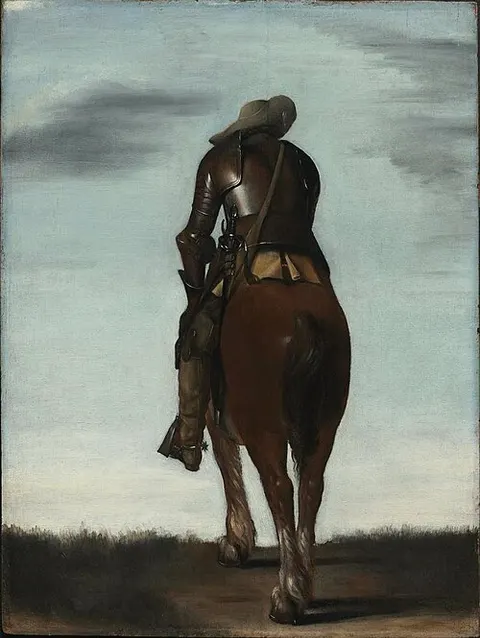 Hombre a caballo visto de espaldas