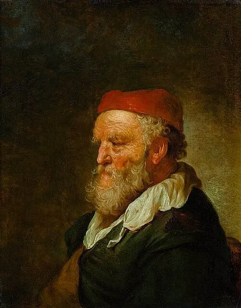 Portrait of an old man in a red hat
