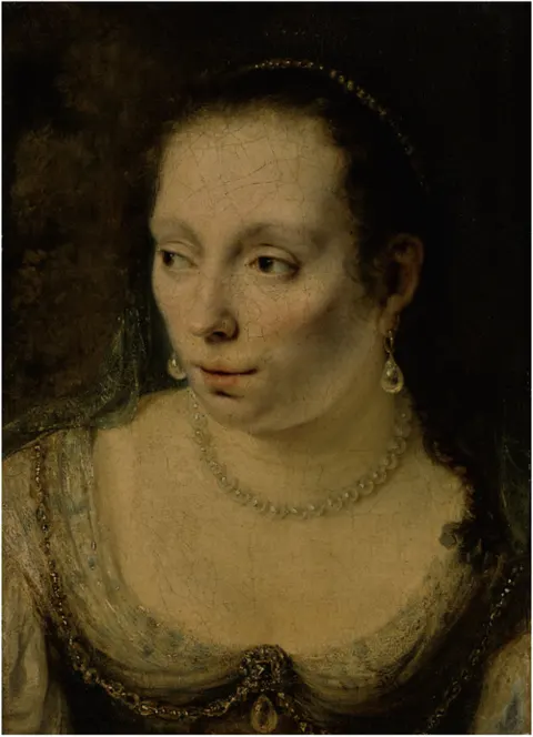 A PORTRAIT OF A LADY, HEAD AND SHOULDERS, WEARING PEARL JEWELRY, POSSIBLY JOHANNA DE GEER